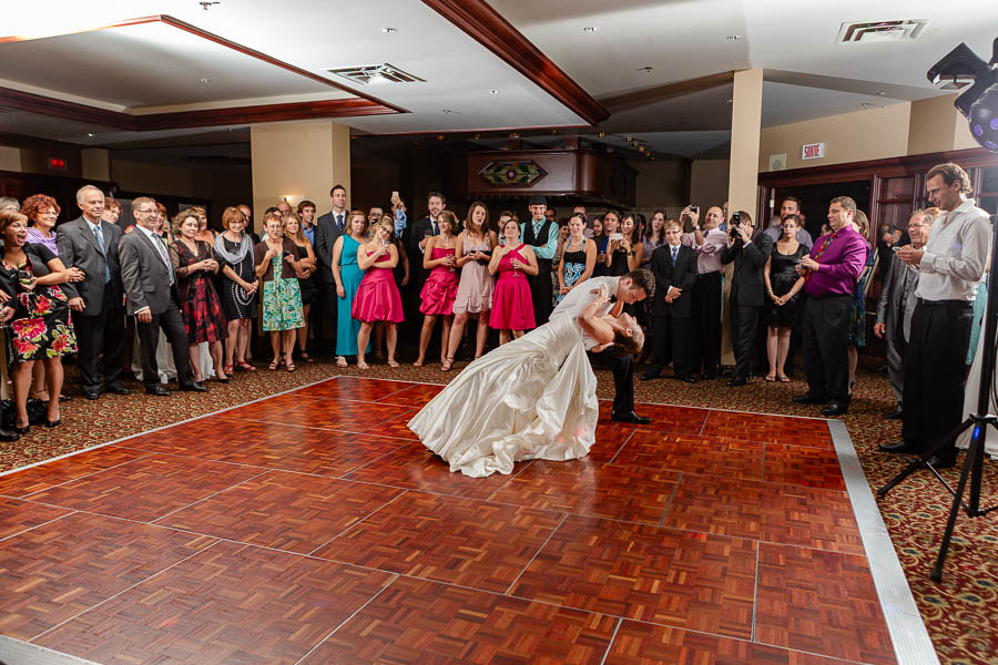 A bride and groom perform their first dance surrounded by guests at the Château Cartier in Ottawa.