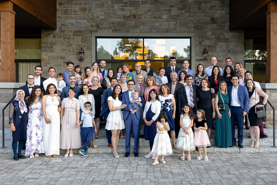Aali poses with his family and friends during a huge outdoor family photo in Ottawa.